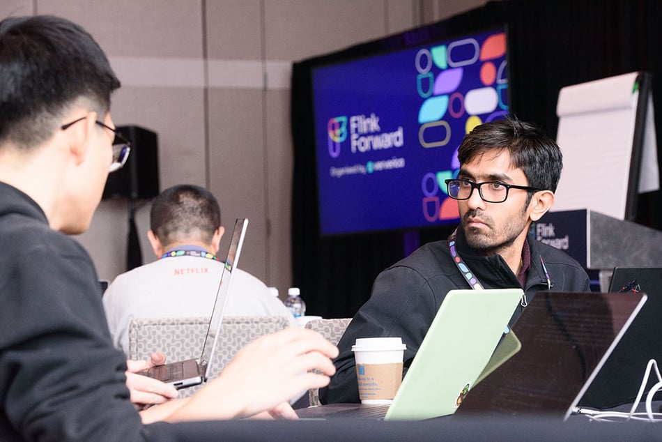 Training attendees at Flink Forward Seattle discuss the live lab exercises. 