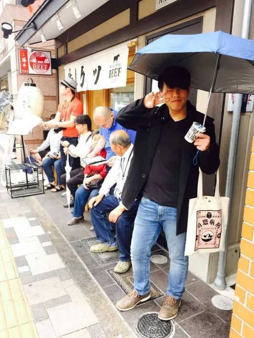 data Artisans engineer and Apache Flink committer Gordon Tai waits in line for beef don